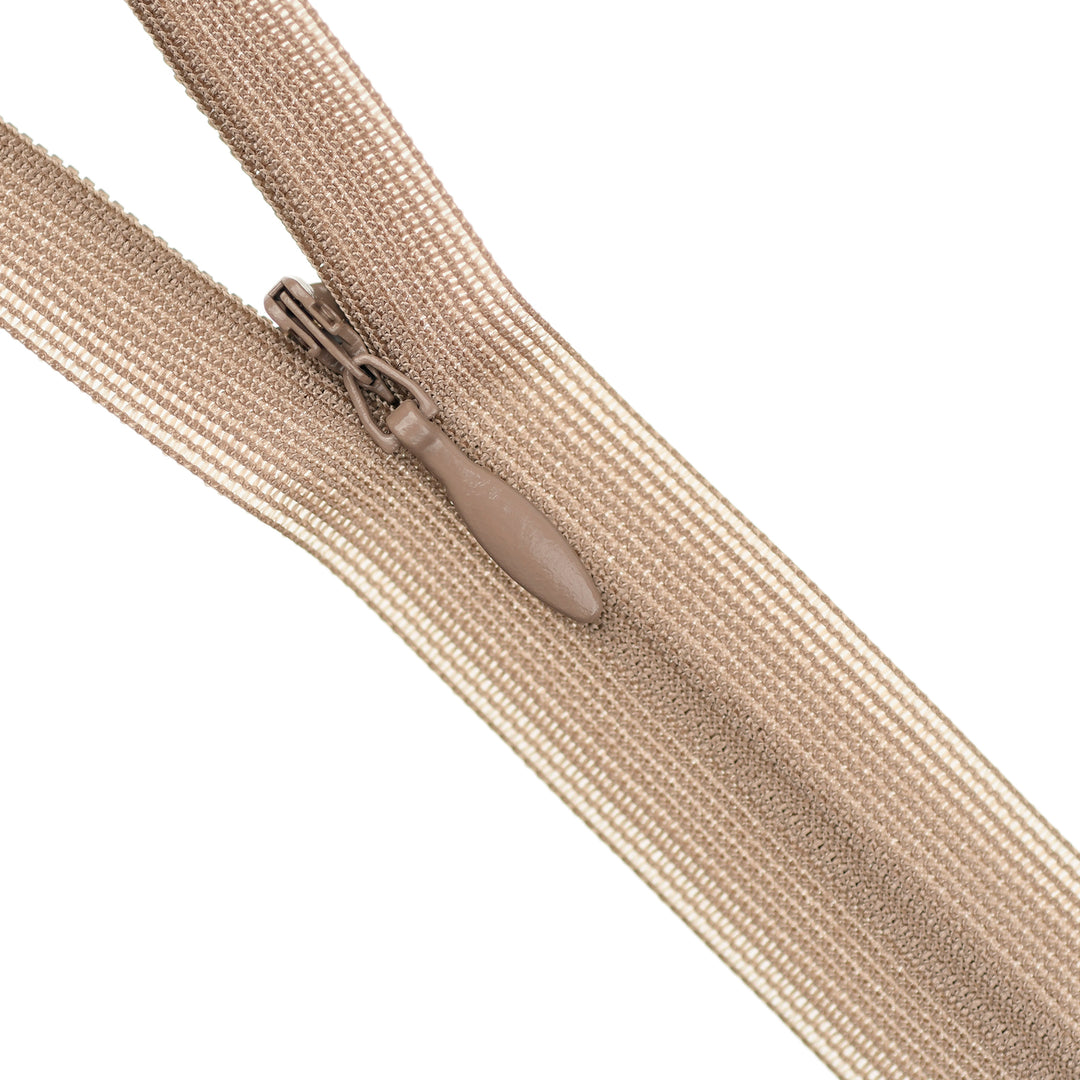 Beige zipper on a white background