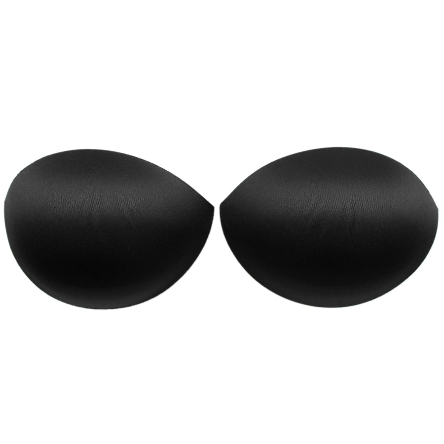 pair of push-up black bra cups on white background