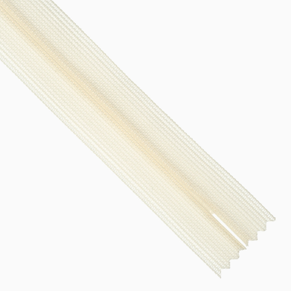 Ivory invisible zipper on white background.