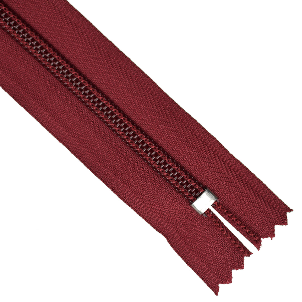 Maroon zipper on a white background