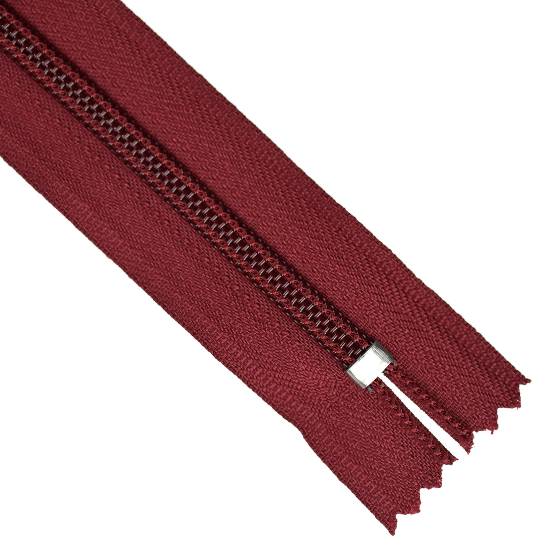 Maroon zipper on a white background