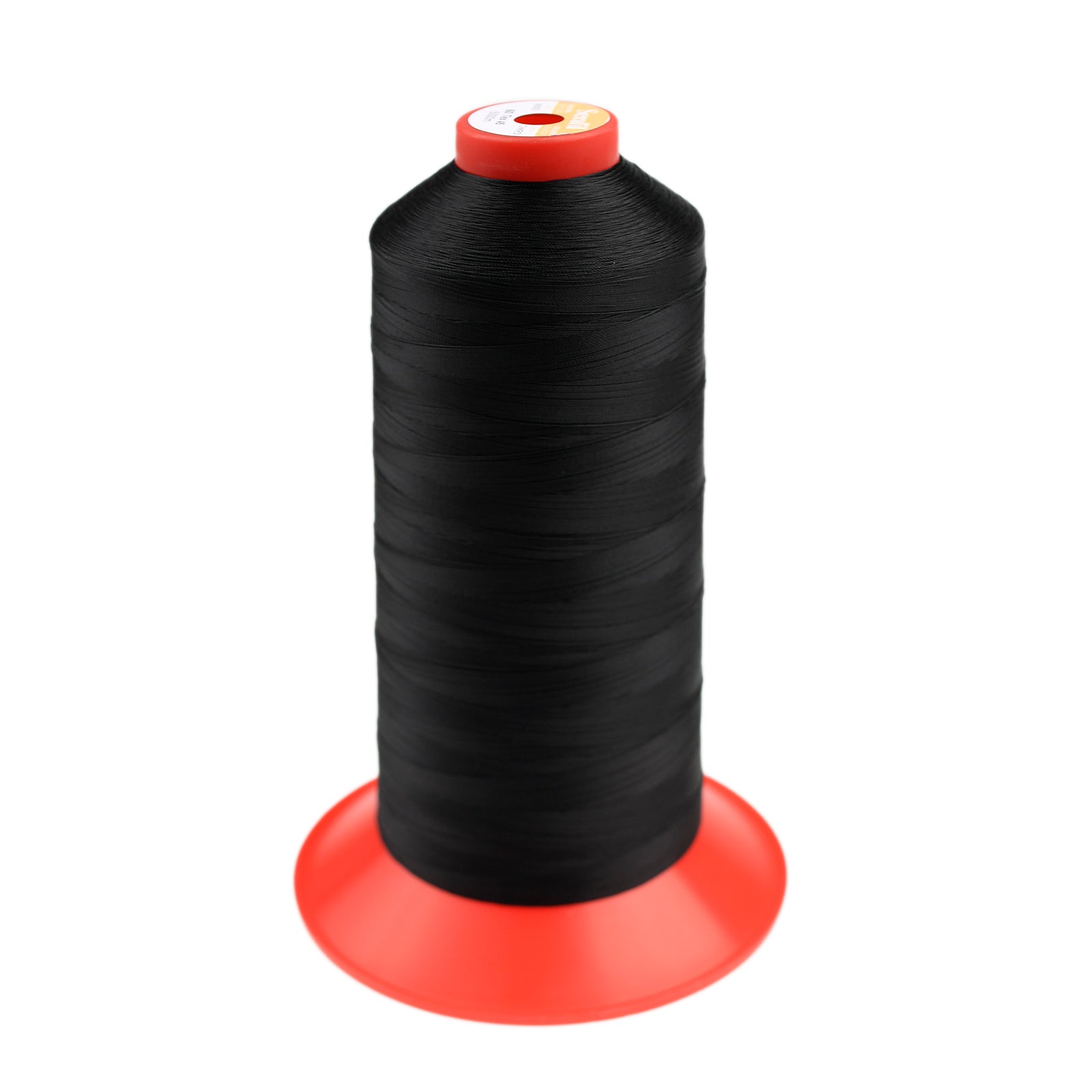 Spool of black thread for leather against a white background