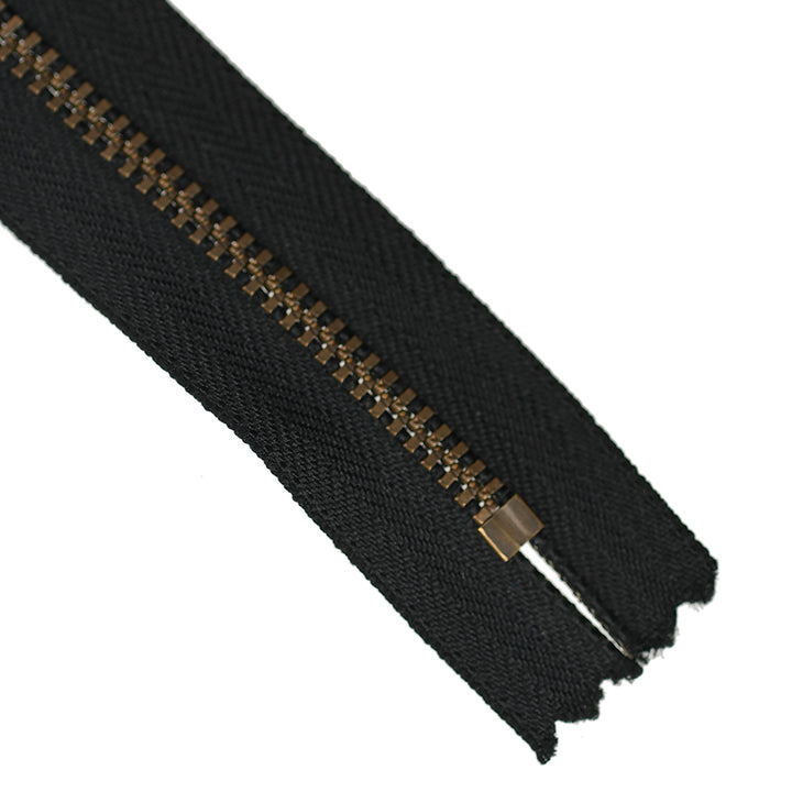 YKK METAL CLOSED-END ZIP NO.3 ANTIQUE GOLD BOARD-PULL COL 580 BLACK