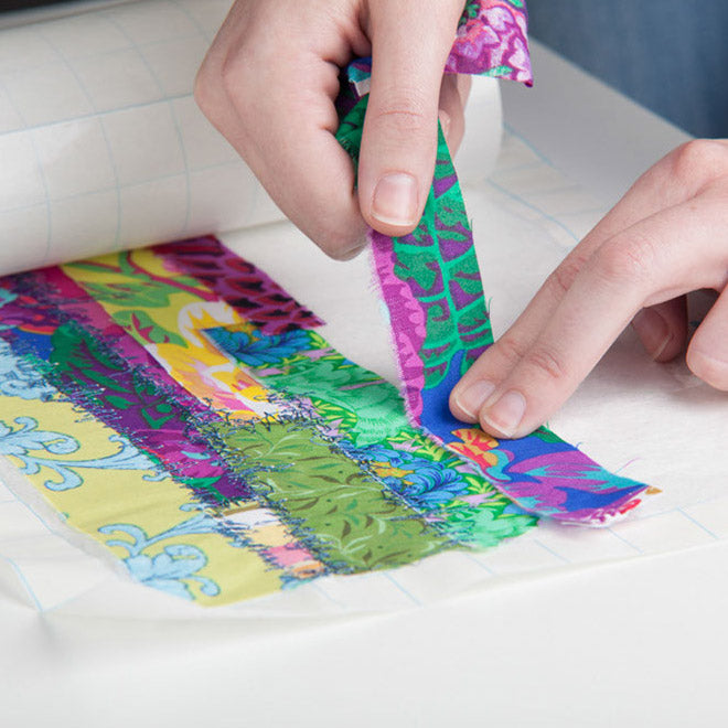 54.5CM VLIESELINE FILMOPLAST H54 SELF-ADHESIVE TEAR-OFF EMBROIDERY BACKING 25GSM WHITE