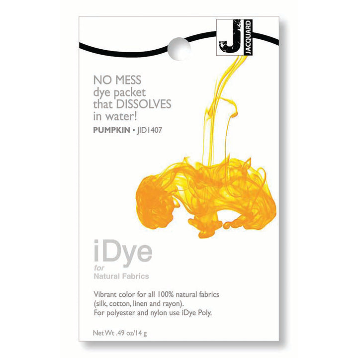 iDye pumpkin dye packet with yellow liquid splash on a white background