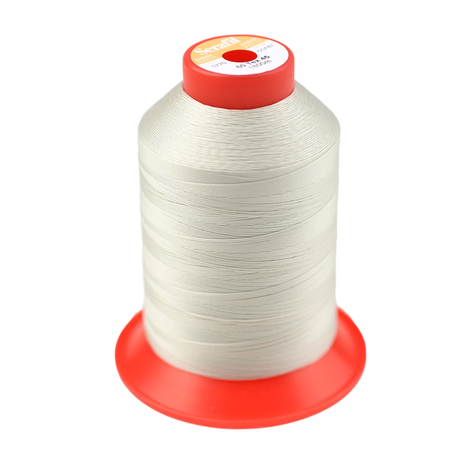Spool of off-white thread against a white background