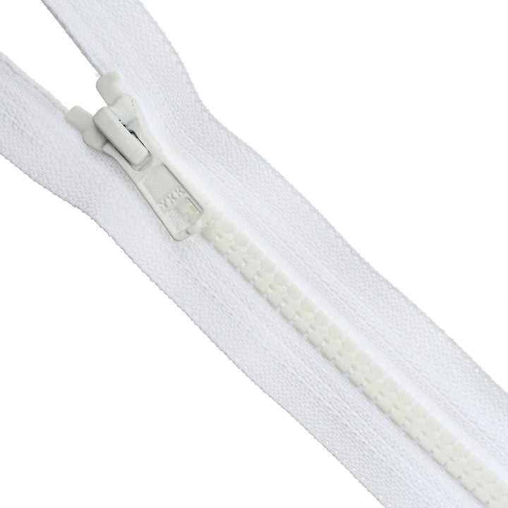 Close-up of a white YKK Vislon zipper on a white background