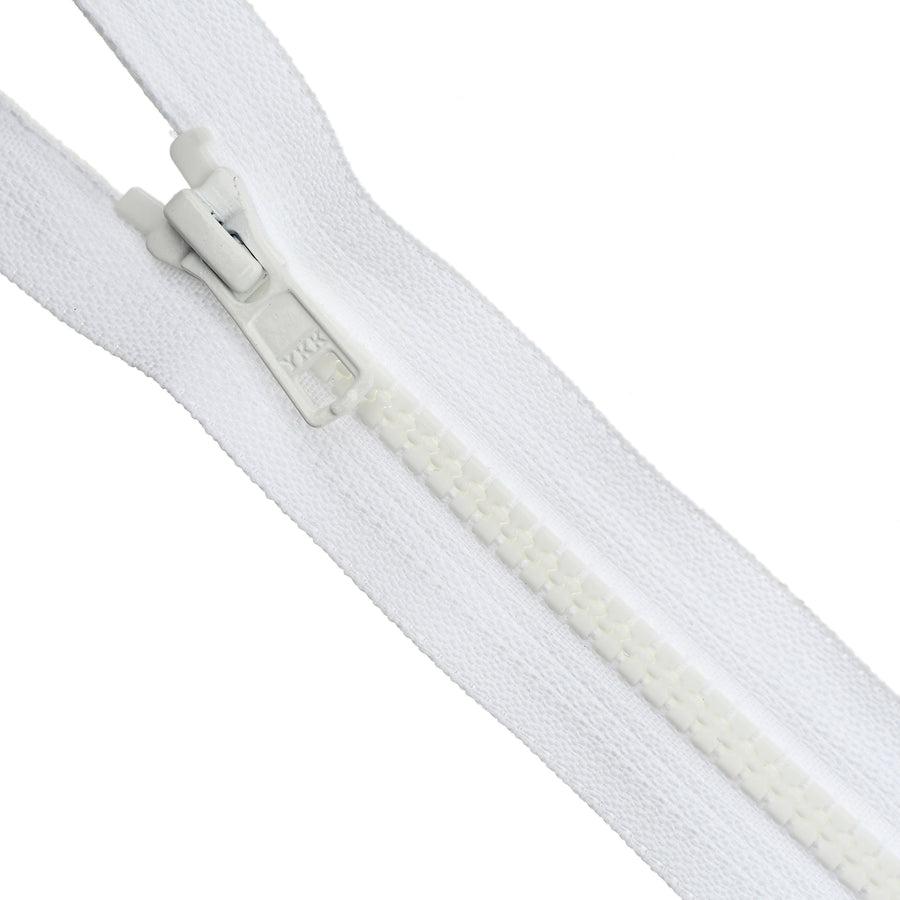 Close-up of a white YKK Vislon zipper on a white background