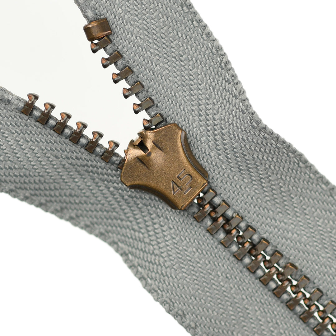 YKK JEAN ZIP NO.4.5 ANTIQUE GOLD COL 577 FOG GREY