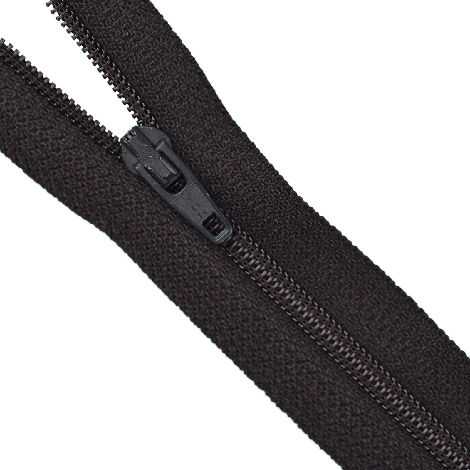 Close-up of a dark purple zipper on a white background